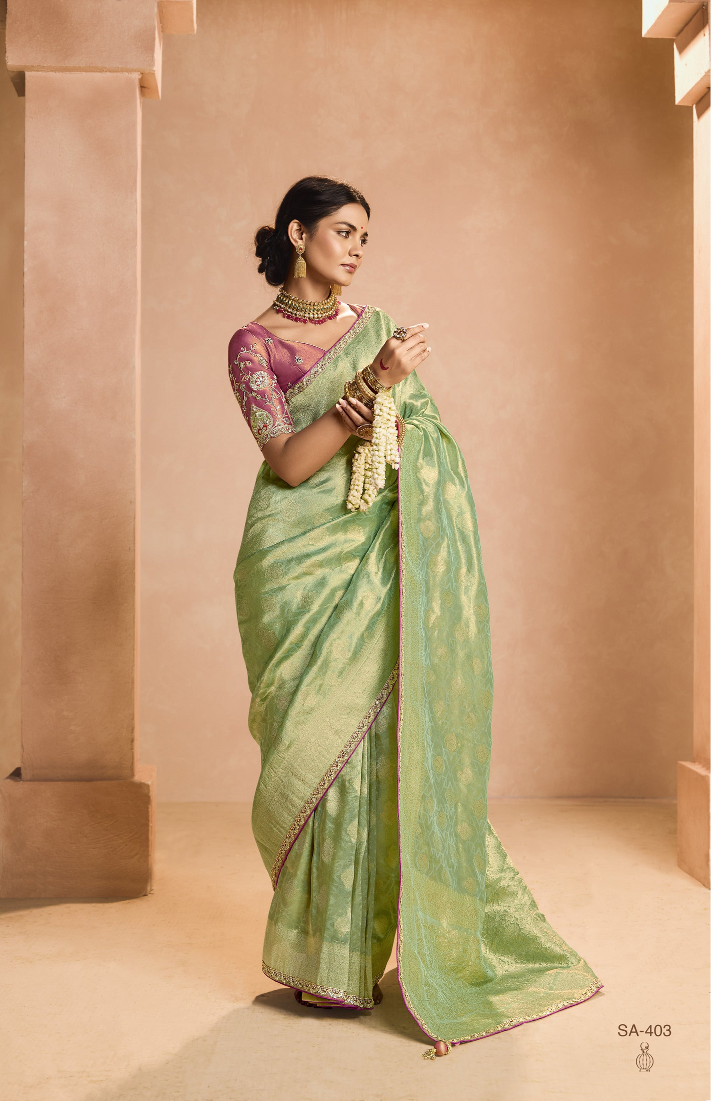 Mint Green Kanjivaram Silk Saree with Wine Embroidered Blouse – Perfect for Weddings & Festive Wear