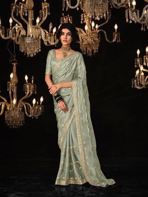 OLIVE GREEN SAREE WITH ELEGANT SILVER EMBROIDERY