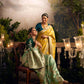 Vibrant Yellow Silk Saree with Teal Embroidered Blouse