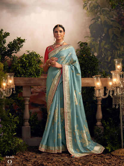 Light Blue Silk Zari Weaved Saree with Broad Border & Red Embroidered Blouse
