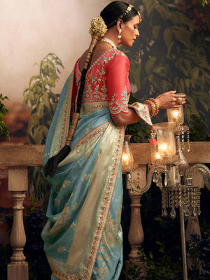 Light Blue Silk Zari Weaved Saree with Broad Border & Red Embroidered Blouse