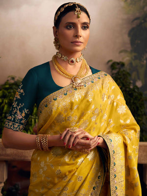 Vibrant Yellow Silk Saree with Teal Embroidered Blouse