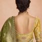 Radiant Green Kanjivaram Silk Saree with Ornate Yellow Blouse – A Regal Ensemble