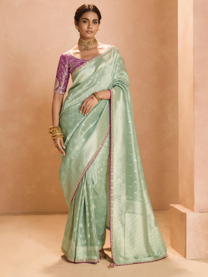 Mint Green Kanjivaram Silk Saree with Elegant Purple Embroidered Blouse – A Dreamy Delight