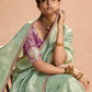 Mint Green Kanjivaram Silk Saree with Elegant Purple Embroidered Blouse – A Dreamy Delight