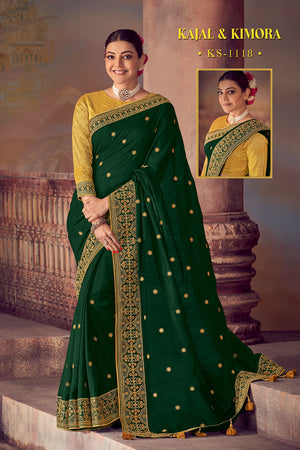 Kimora Dark Green Woven South Silk Saree With Embroidered Work Blouse