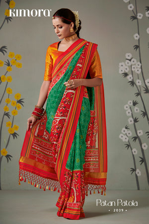 Kimora Green And Orange Patola Saree