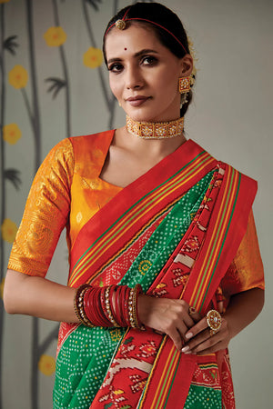 Kimora Green And Orange Patola Saree