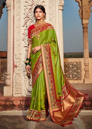 Kimora Pear Green Classic Banarasi Saree With Designer Blouse