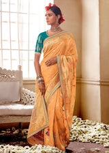 Kimora Sandy Orange And Green Banarasi Saree With Designer Blouse